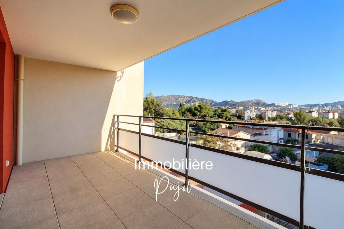 Timone 13010 - T3 traversant avec terrasse et parking – photo 1